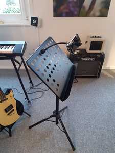 music stand with integrated holder
